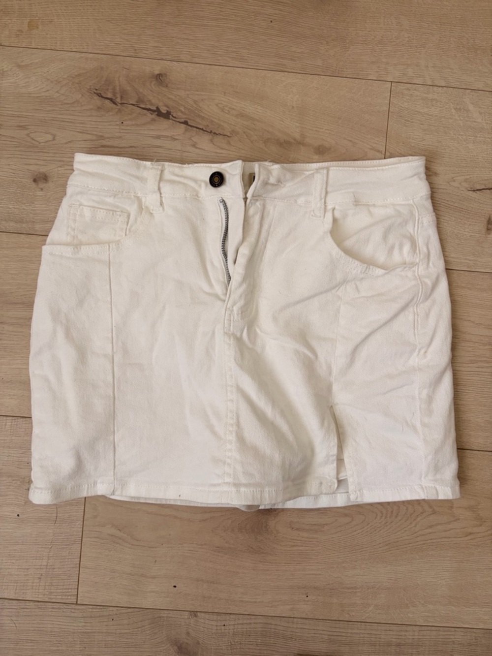 Luvamia White Denim Mini Skirt - Front Zip Detail